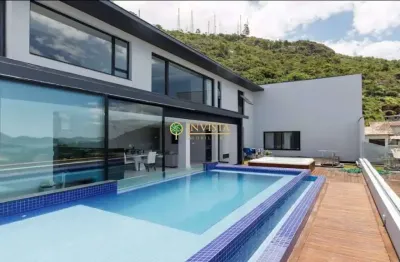 Varanda gourmet com piscina e jacuzzi, vista mar e 4 quartos - à venda próximo à ufsc na trindade.