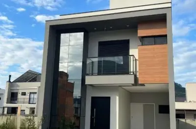 Condomínio fechado, 3 quartos sendo 1 suíte e 2 vagas no bairro beira rio - biguaçu