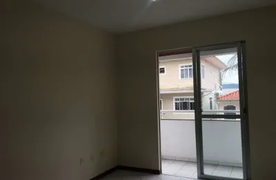 Próximo ao Ginásio Municipal Picadas do Sul, com 2 quartos, sacada e 1 vaga