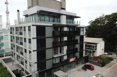 Novo com 2 quartos, sacada com churrasqueira e 1 vaga livre à venda em Canasvieiras.