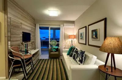 Mobiliado, sacada com churrasqueira, 2 quartos, 1 vaga e área de lazer completa à venda na praia brava.