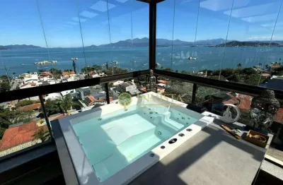 Vista mar, sacada com churrasqueira, terraço privativo com jacuzzi, 2 suítes e 2 vagas à venda em coqueiros.