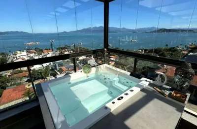 Vista mar, sacada com churrasqueira, terraço privativo com jacuzzi, 2 suítes e 2 vagas à venda em coqueiros.