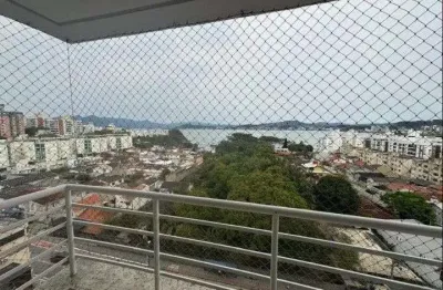 À venda | condomínio alto padrão, sacada com churrasqueira, semi mobiliado e 2 vagas de garagem - abraão, em florianópolis.