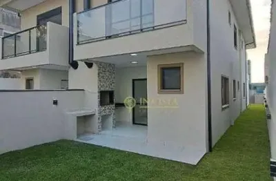 Sobrado à venda em canasvieiras! 3 quartos, varanda com churrasqueira, sacada e 2 vagas de garagem.