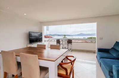 Apartamento com 3 quartos, sacada com churrasqueira, 150 metros da praia e com linda vista panorâmica para o mar - à venda em jurerê.