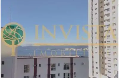 Sala comercial com 35m² privativos, vista mar e 1 vaga no bairro estreito.