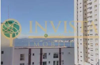 Sala comercial com 35m² privativos, vista mar e 1 vaga no bairro estreito.