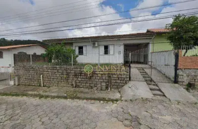 À venda em forquilinha! 4 quartos, churrasqueira e 2 vagas de garagem.