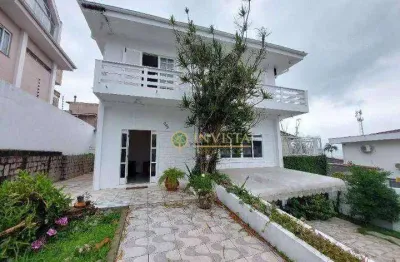 À venda em coqueiros! casa com 4 suítes, churrasqueira e 5 vagas de garagem.