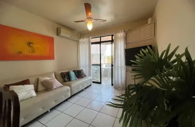 À venda | 79 m², Semi mobiliado, 2 quartos, sacada e 1 vaga de garagem - Praia de Canasvieiras, em Florianópolis.