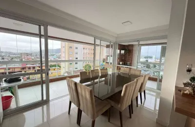 Andar alto, 3 quartos, sacada com churrasqueira, semi mobiliado e 2 vagas de garagem - à venda no centro de palhoça.