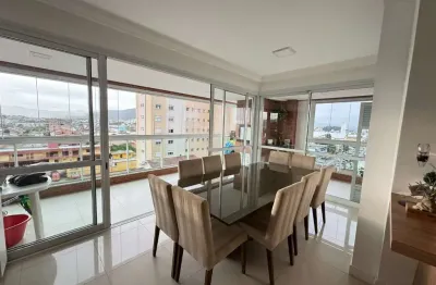 Andar alto, 3 quartos, sacada com churrasqueira, semi mobiliado e 2 vagas de garagem - à venda no centro de palhoça.