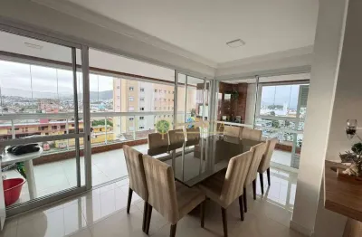 Andar Alto, 3 quartos, sacada com churrasqueira, Semi mobiliado e 2 vagas de garagem - À venda no Centro de Palhoça.