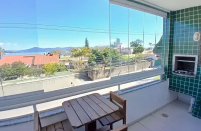 À venda em jurerê! vista mar, sacada com churrasqueira, 3 quartos e 2 vagas de garagem.