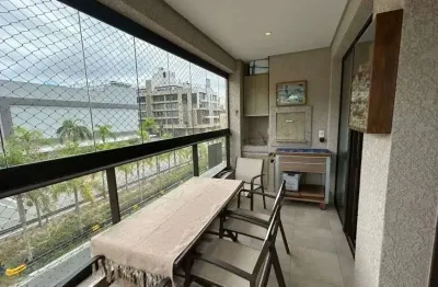 À venda na praia de jurerê! semi mobiliado, 2 quartos, sacada com churrasqueira e 1 vaga de garagem.