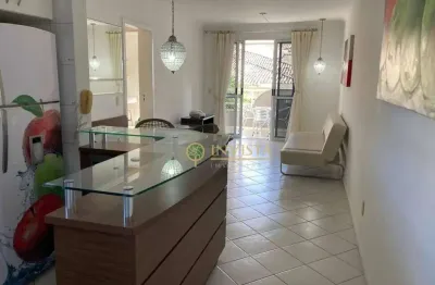 À venda na praia de jurerê internacional! 2 quartos, sacada com churrasqueira e 2 vagas de garagem.