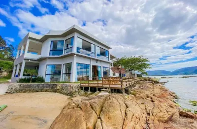 À venda | frente mar, 5 quartos, pé na areia, 450m² e 2 vagas de garagem - guaporanga, biguaçu.