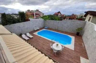 2 pavimentos, 4 quartos, sacada, piscina e 2 vagas de garagem - à venda no bairro carianos