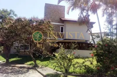 Locação | condomínio fechado, 490 m², acesso direto para praia, 4 quartos e 4 vagas de garagem - rio tavares, em florianópolis.