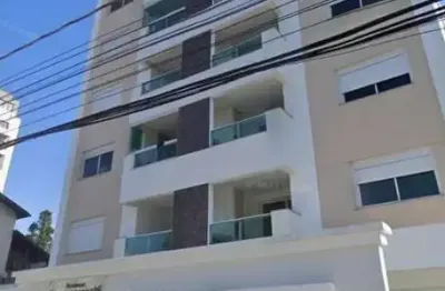À venda | 77 m², Sacada com churrasqueira, 2 quartos e 2 vagas - Capoeiras, em Florianópolis.
