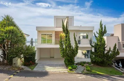 Casa com 5 quartos à venda em florianópolis/sc, condomínio fechado, vista mar e 2 vagas - bairro joão paulo.