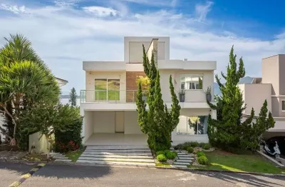 Casa com 5 quartos à venda em Florianópolis/SC, Condomínio Fechado, Vista Mar e 2 vagas - Bairro João Paulo.