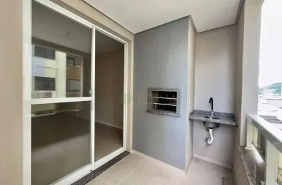Apartamento com 2 quartos em campinas! sacada com churrasqueira, semi mobiliado e 1 vaga - são josé/sc.
