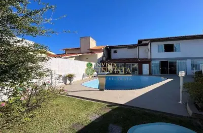 Casa de alto padrão, com terraço e vista parcial mar à venda na agronômica.