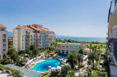 Apartamento à venda no il campanario villaggio resort - praia de jurerê, em florianópolis!