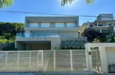 Casa com piscina privativa e vista mar em florianópolis/sc! 5 suítes, alto padrão, churrasqueira e 6 vagas - praia brava.