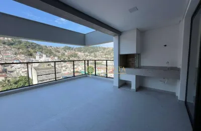 À venda no centro de florianópolis! terraço privativo com churrasqueira, andar alto e 3 quartos.