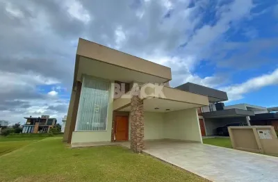 Casa Mobiliada de Alto Padrão em condomínio fechado em Torres RS.