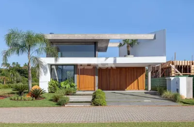Casa em condomínio 3 dormitórios à venda condomínio reserva das águas torres/rs
