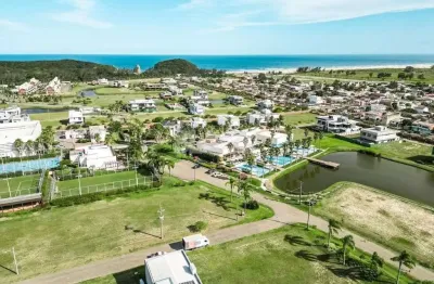 Amplo lote à venda com 900 m² no condomínio ilhas park em torres rs