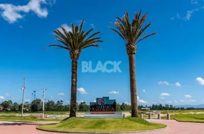 Terreno à venda na Rua Manhattan, 100, Praia Caravelle, Passo de Torres