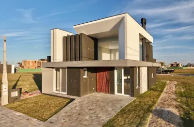 Casa em condomínio fechado com 3 quartos à venda no Centro, Xangri-Lá 