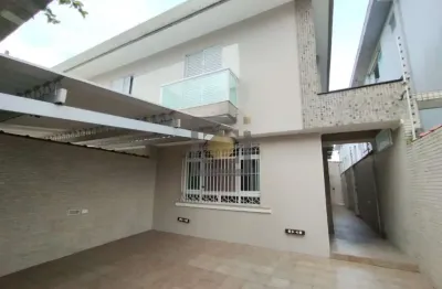 Casa à venda em santos-sp, campo grande: 3 quartos, 3 suítes, sala ampla, cozinha planejada, 5 banheiros e 2 vagas de garagem. aproveite!