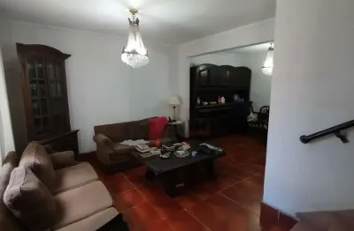 Casa à venda em Boqueirão, Santos – 3 dormitórios, 2 vagas, 110 m², frente, financiamento liberado