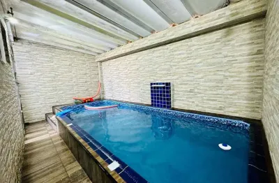 Casa à venda em Boqueirão, Santos – 3 quartos (1 suíte), 172m², frente, 2 vagas