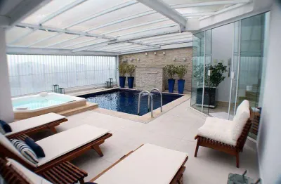 Cobertura de Luxo Frente ao Mar em Santos – 4 suítes, 6 vagas, vista panorâmica