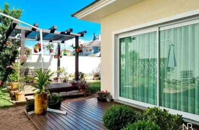 Casa com 3 dormitórios à venda, 243 m² por r$ 1.590.000,00 - dom feliciano - gravataí/rs