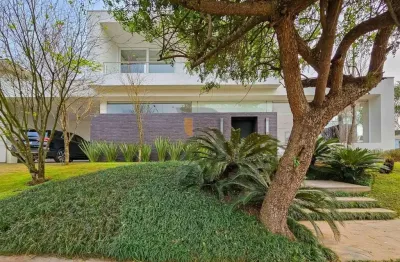 Casa mobiliada com 338m² com 3 suítes em terreno de 806m² - alphaville/gravataí