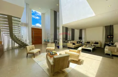 Casa à venda no condomínio suíça da cantareira, 4 suítes, 6 vagas, piscina e churrasqueira.