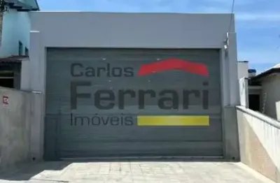 Galpão comercial para locação na água fria com estacionamento em frente.