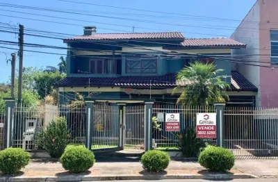 Casa com 4 quartos à venda na Rua Tenente Antônio João, 228, Loteamento Bela Vista, Canoas