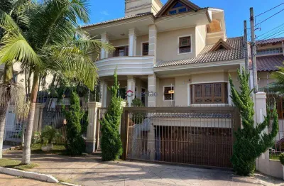Casa com 4 quartos à venda na Rua das Bromélias, 240, Estância Velha, Canoas