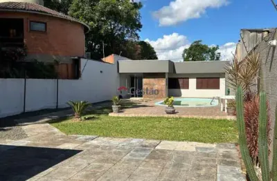 Casa  em niterói, canoas - área urbana com jardim e piscina