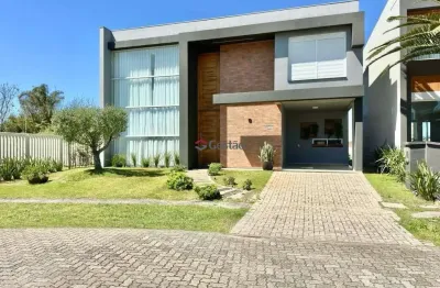 Sobrado mobiliado e decorado em condomínio fechado c/04 quartos (04 suítes) em capão da canoa/rs