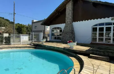 Casa com 3 quartos à venda na Rua Nena Trevisan, 7, Centro, Porto Belo